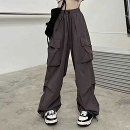 Capris Cargo Pants Hip Hop Bag Solid Color Multi Pocket Taille élastique assortie Pantalon ample et respirant Vêtements pour femmes HDK230703