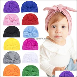 Gorras Sombreros 15736 Europa Moda Infantil Bebé Sombrero Orejas de conejo Turbante Nudo Headwrap Gorro para niños Gorros 12 colores Entrega de la gota 2021 Mxhome Dhhnt