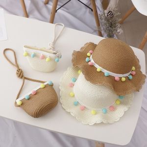 Petten Hoeden Kinderen Meisjes Grote Brede Rand Stro Geweven Zonwering Strandhoed Kleurrijke Pompom Ball Zomer Floppy Bucket Cap Draagbare Handtas 230601