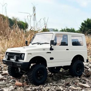 Car 1/10 WPL RC Car C74 Jimny Warrior 2.4g Remote Contrôle Offroad Véhicule FullScale Electric Four Wilding Triping Tyt Toy