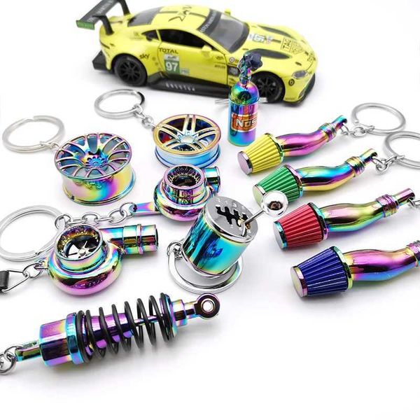 Clé de voiture Pièces de voiture Porte-clés NEO Chrome Porte-clés en métal Moyeu de roue Bouteille de gaz d'azote Amortisseur Porte-clés Sifflet Turbine Auto InteriorL231153