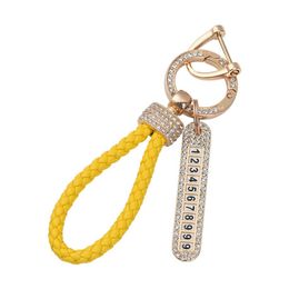 Porte-clés de voiture réseau féminin chaîne rouge pendentif chaîne incrusté de diamants porte-clés anneau suspendu corde Anti perte plaque d'immatriculation beaux cadeaux