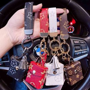 Porte-clés de voiture accessoires de luxe en cuir marque amour pour les femmes boucle cadeau créatif Girly voiture porte-clés anneaux pendentif décoration H112316K