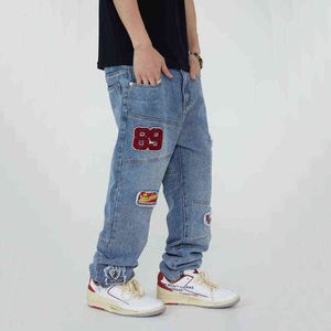 Autoletters Patch Design geborduurde jeans mannen hiphop losse rechte pijten broek stiksels casual streetwear baggy denim broek T220803