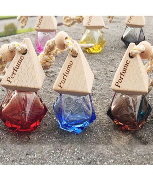 Perfume de voiture Pendentif Pendre d'huile essentielle Diffuseur 9 couleurs Vêtements de sac Ornements Pendants Air Faiilles Bouteilles en verre Perfum2227678