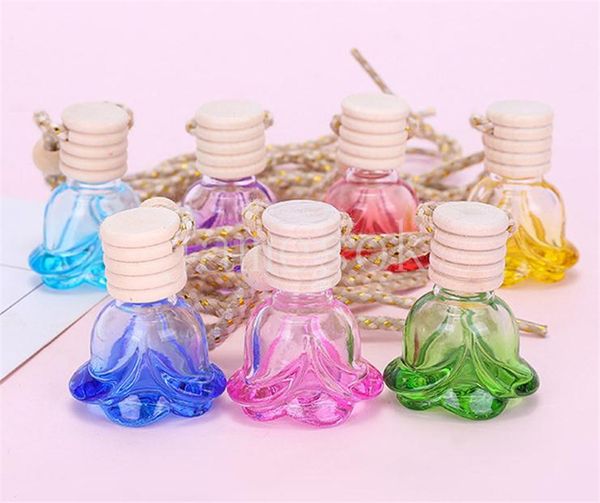 Pendentif de parfum de voiture, diffuseurs d'huiles essentielles bouteille d'aromathérapie colorée en forme de rose, ornement monté sur véhicule, DB584