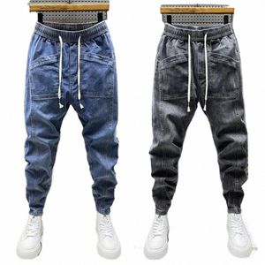 Cargo Harem Pantalones Primavera Otoño Hombres Jeans Fi Bolsillos con cordón Pantalones de mezclilla Color sólido Casual Multi-bolsillo Hombres Pantalones b1KB #