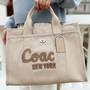 Cargo Luxurys Handsbags High Capace Designer Sac à provisions pour l'homme Woman Sacoche Pochette Sac à bandoulière POCHET