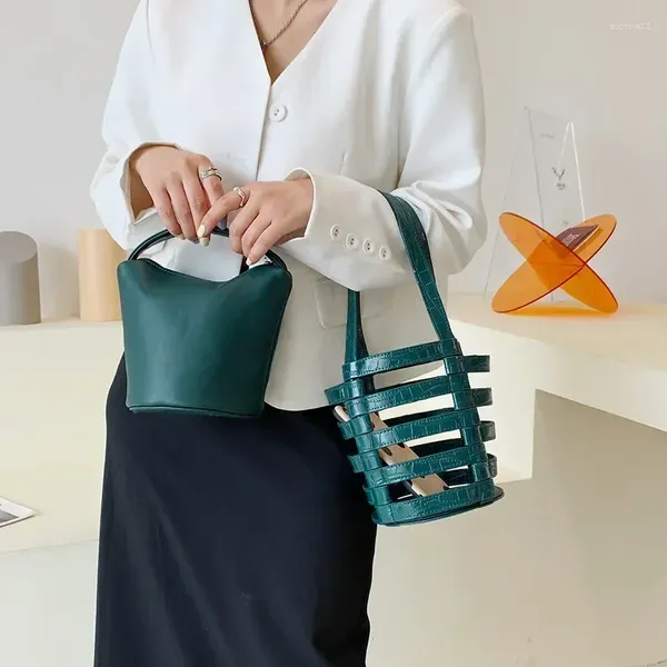 Alfombras Diseñador de la marca Bolsa de cubo hueco tejido a mano 2024 tendencia PU hombro bolso de lujo y bolso de compras femeninas de compras femeninas