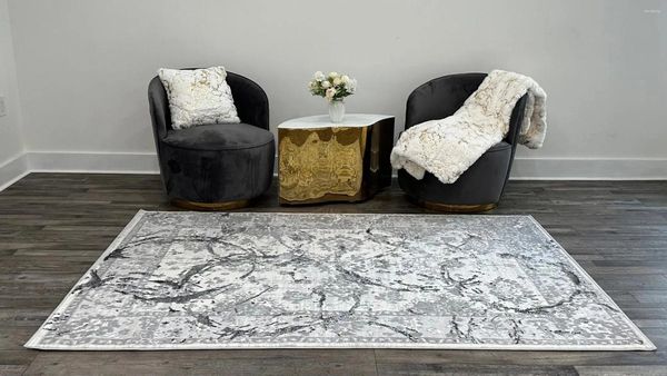 Tapis de luxe Carpets en gris avec cercles argentés, motif abstrait