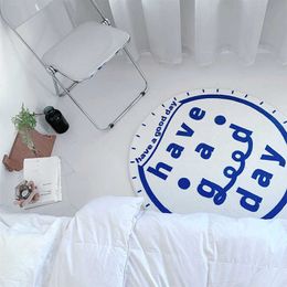 Tapijten Minimalistische stijl Klein Blue Geroolde ronde tapijt woonkamer salontafel slaapkamer slaapkamer beddeken huishoudboard vloer vloer mat H240517