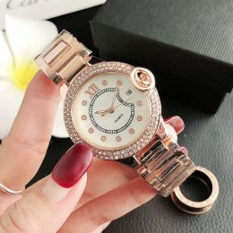 Nouvelle marque de mode montres femmes fille style cristal cadran bande d'acier montre-bracelet à quartz vente chaude dame montre concepteur d'expédition gratuite