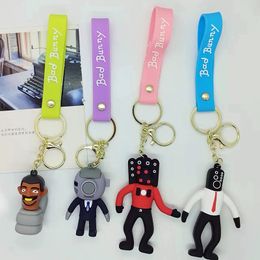 Porte-clés de poupée, moniteur de combat, dessin animé, toilettes, homme, pendentif, décoration de sac, accessoires de porte-clés de voiture