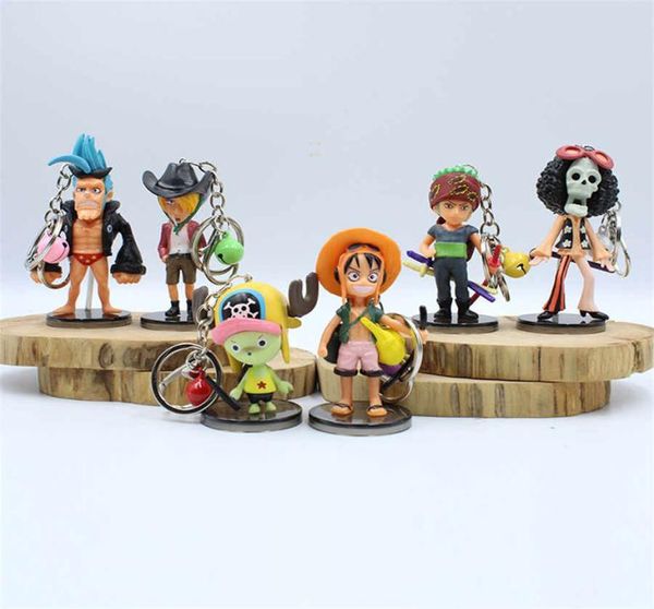 Figuras de dibujos animados llavero llavero Luffy Sabo Roronoa Zoro Sanji Nami Law Bell Cadena de llave PVC Figuras de acción Modelo Toys 6pcsset7852345