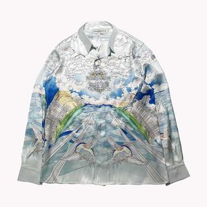 Casa Diseñador Moda Ropa Camisas Chándales Casablanca 22ss Mezquita Cielo azul Nube blanca Pez volador Aviones Seda Camisa de manga larga suelta