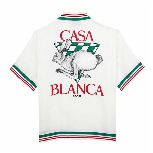 Camisa abotonada de Casablanca Conejo Cisne Naranja Avión Castillo Cancha de tenis Camisas de manga corta hawaianas para hombres y mujeres Tendencia