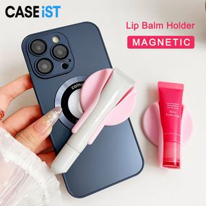 Caseïstische mode lipbalsem telefoon houder terug kast sterke magnetische lippenstift glanzend grip make -up montage bracket mascara stand ins ontwerper mobiele clip voor iPhone android