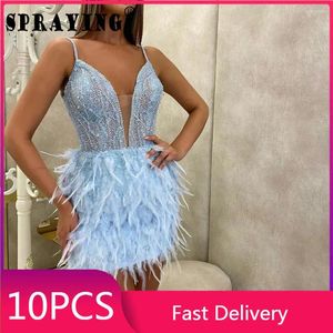 Robes décontractées 10pcs femmes sexy y2k sequin mince plume solide brillant spaghetti sangle dos nu mini robe articles en gros S12940