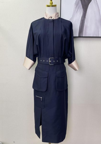 Robes décontractées 2023 printemps / été col rabattu Paux couleurs contrastées doubles poches latérales avec ceinture taille robe fendue femme