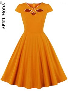 Vestidos casuales 2023 verano Vintage Swing pasarela vestido Cruz ahuecado diseño sólido amarillo elegante línea A 50s 60s señoras
