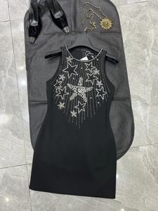 Robes décontractées 2024 Début du printemps Noir Pentagram Motif clouté Diamant Col rond A-ligne Gilet Jupe avec fesses Femme Mini