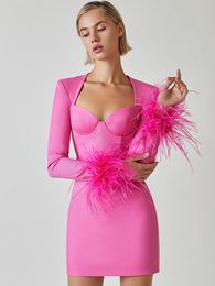 Casual jurken aankomst vrouwen winter sexy lange mouw veer veer roze zwarte mini bandage jurk elegante avondclub feestjurk 230303