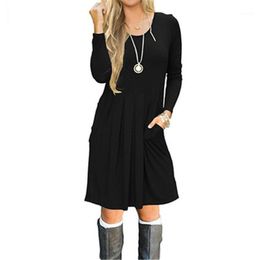 Robes décontractées automne et hiver col rond manches longues couleur unie robe de poche femme