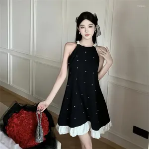 Robes décontractées célébrités Lady Perles Petite robe noire Summer Sexe Sexe Mini une ligne de fête Ruffles Hem Loose sans manches