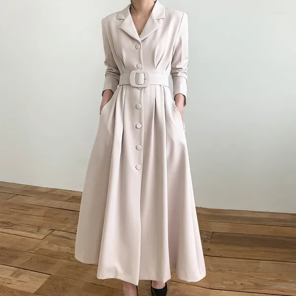 Robes décontractées Chic élégant automne printemps simple boutonnage coupe-vent longue robe pour femmes col cranté poches bureau dames ceinture maxi