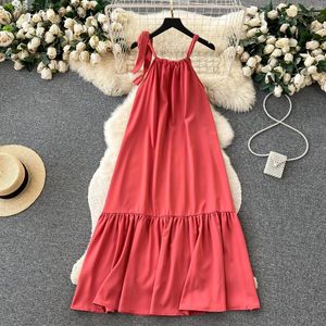 Vestidos informales de tela Mujeres Moda de color naranja Strapa Boil Pit Square Collar Collar sin mangas Backless Beach Wear Midi Mujer QC570