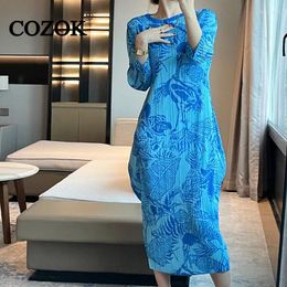 Robes décontractées Cozok All-Match Imprimé rond Coule plissé 2024 Robe de printemps Femmes Elegant Petal Sleeve Long Mid-Calf Fashion WT638