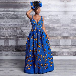 Vestidos casuales Europa y los Estados Unidos Estampado de plumas explosivas Correa para usar Vestido africano Estilo étnico Mujeres Sexy Abertura larga