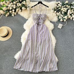 Vestidos casuales Foamlina Seaside Vacation Girl Hollow Cintura Slim Retro Stripe Vestido de mujer Ajuste sin respaldo Halte Sling A-Line Holiday