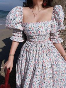 Casual jurken gefragmenteerde bloem sexy rugloze jurk Dames royale kraag ontwerp vakantie aan zee met gesplitste lange rok