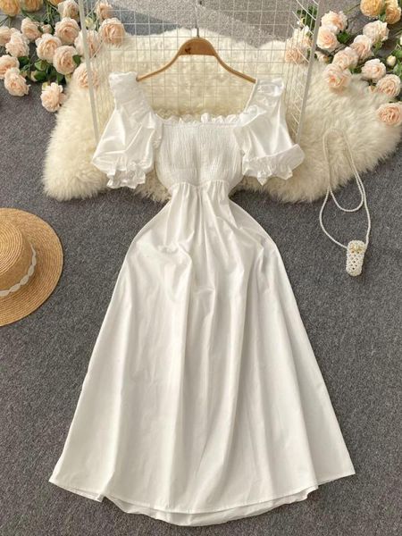 Robes décontractées Français Robe Blanche Femmes D'été Robe Sexy À Manches Courtes Bouffantes Robe Femme Retour Évider Arc Vintage Doux Midi Élégant