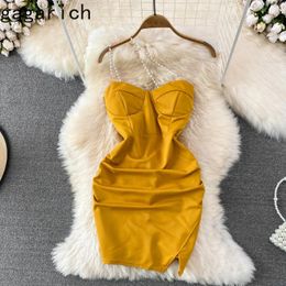 Robes décontractées Gagarich Sexy Nightclub Suspenten Robe Fashion Backlessles sans manches Slim 2024 Figure coréenne Fesses en bas