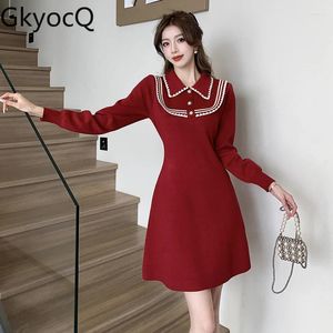 Casual jurken gkyocq jaar rode feestjurk vrouwen gebreide kleur botsing met lange mouwen reve kraag taille slank een lijn breien chic