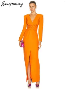 Casual jurken hoogwaardige dames oranje sexy v-neck lange mouwen geplooide split maxi jurk 2024 elegante avond beroemdheid feestvestido