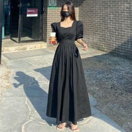 Vestidos casuales Coreano Chic Verano Temperamento francés Cuello cuadrado Máquina cuidadosa Cintura sin respaldo Mostrar delgada burbuja manga vestido MIDI