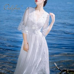 Casual jurken Ordifree 2023 Zomer vrouwen witte lange jurk sexy transparante vintage kant maxi tuniek strandroeping