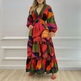 Freizeitkleider Bedrucktes A-Linien-Kleid mit Rüschensaum und langen BallonärmelnLässig