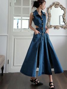 Robes décontractées Sexy évider bleu Denim robe moulante élégant revers sans manches mode boutons mince haute fente fête pour les femmes
