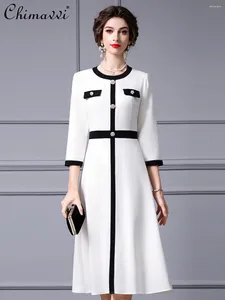Robes décontractées de style français printemps de style français élégant en noir et blanc robe couleur contraste mode ol hauts slim 3/4 manches