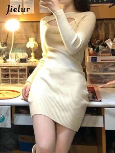 Robes décontractées hiver sexy évider beige tricot femmes mode française couleur unie mince manches longues femme mini robe