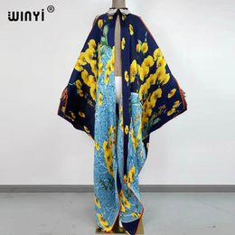 Robes décontractées Winyi Sukienka Mode Summer Kimono Robe Afrique Taille libre Femme Froissé Floral Imprimé Vacances élégantes en vrac