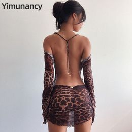 Robes décontractées Yimunancy Leopard Imprimé femmes inutiles à manches longues Mesh Spring Halter Transparent Sexy Club Vestidos 230216