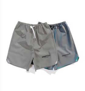 Hommes décontractés Sporty Laser Réflective Shorts Impression Vintage Streetwear Fitn Hip Hop Male Pants courts 7205927