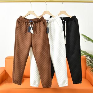 Pantalons de survêtement décontractés pour hommes Hip Hop femmes imprimé lettre mâle lâche luxe confortable tout-match gaufre mode design de rue confort joggers reliure jambe pantalons de survêtement