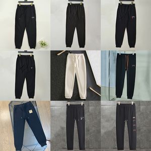 Pantalons de survêtement décontractés pour hommes polaire technique Hip Hop femmes lettre imprimée pantalon à cordon confortable automne et hiver design confort pantalons de survêtement joggers de haute qualité