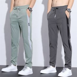Casual broek mannen zweetbroek Sport Zwart grijs vaste kleur rechte broek Elastische taille comfortabel 220706